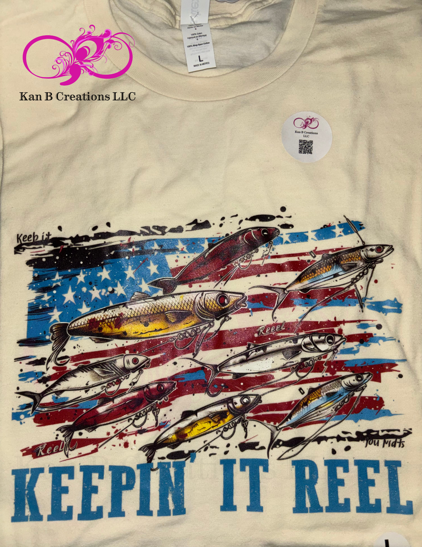Beige t-shirt with fishing lure design and 'Keepin' It Reel' text on a flag background.